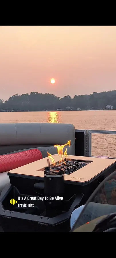 Floating Flame lit on Eric's pontoon at sunset
