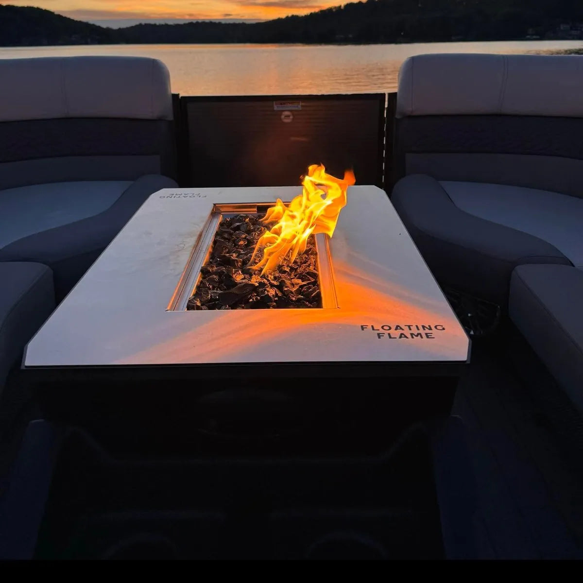 Flame lit on the deck at dusk