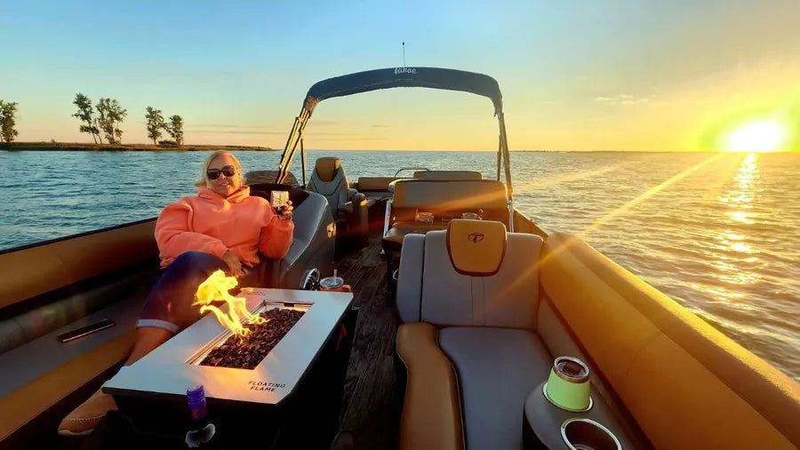 Floating Flame lit on Jim T.'s pontoon at dusk